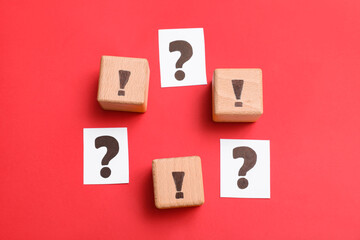 Composition with question and exclamation marks on red background