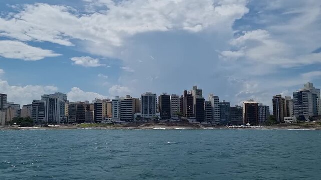 Praia das Virtudes Coastline with City Buildings Seen from Boat in Esp&iacute;rito Santo