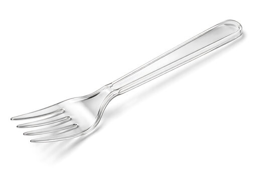 clear plastic fork four tines diagonal white background