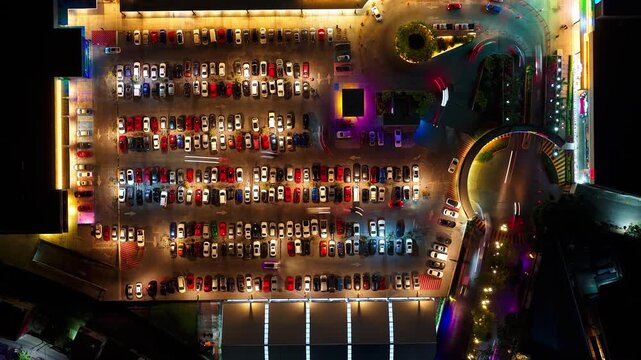 Top down static night timelapse of parking lot