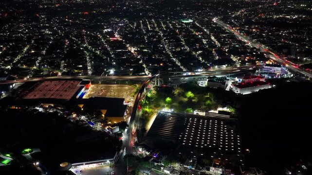 Night city timelapse dolly in over Cuernavaca, Mexico