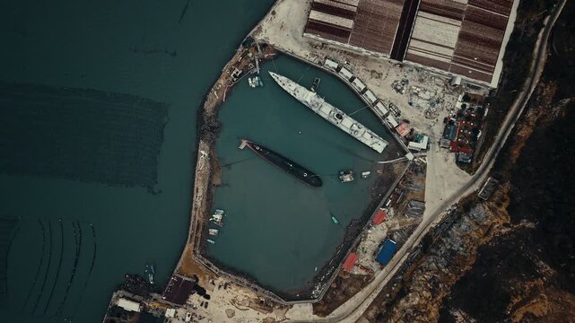 Abandoned Class Kilo Submarine next to the sea