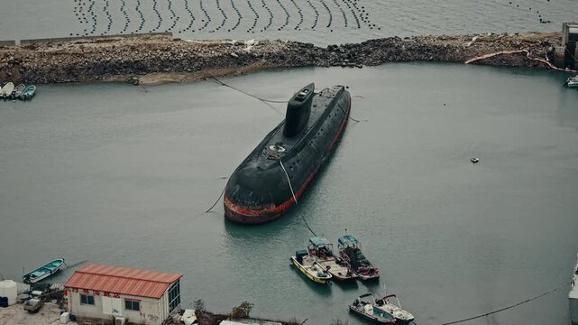 Abandoned Class Kilo Submarine next to the sea