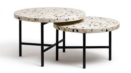 Two nesting coffee tables with speckled tops and black metal legs