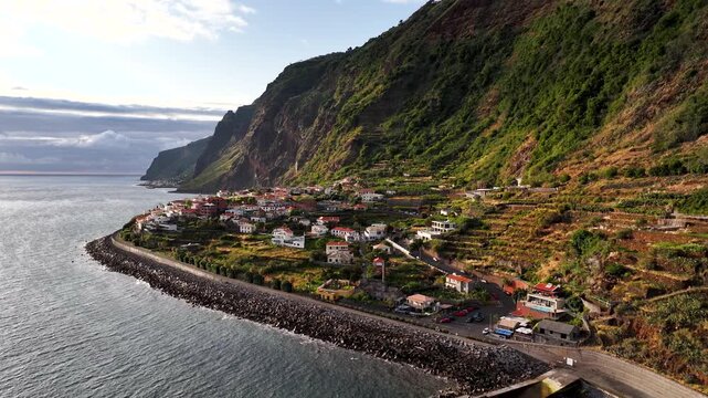 Coastal village of Jardim do Mar on Madeira coast, sunset aerial pullback