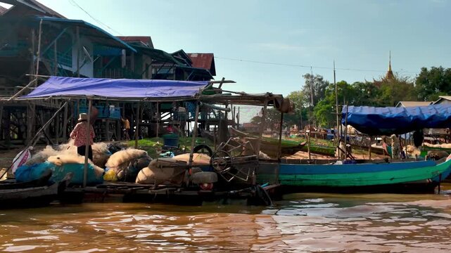 Cruising past the floating village of Kampong Phluk near Siem Reap in Cambodia.