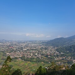 Fototapeta premium Scenic View of Town in Valley.