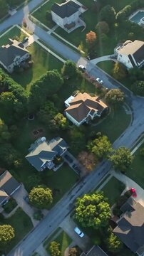 Vertical Screen, Johnson City, USA, Tennessee Evening Aerial Over TreeLined Houses Golden Hour Glow On Roofs And Lawns, Tidy Driveways And Porches, Warm Streetscape With Cozy Residential