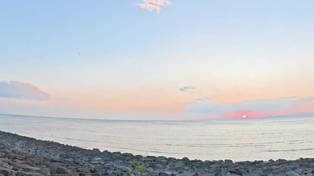 Golden sunset over coastal river at Kuala Perlis Malaysia