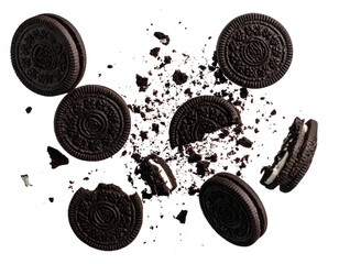 Scattered chocolate cookies with cream filling on transparent background isolated