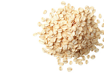 Pile of dry, beige, rolled oats against a dark backdrop