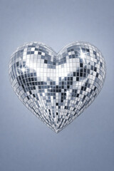 Silver Disco Ball Heart Symbolize Love and Celebration on Light Blue Background
