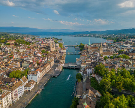 Aerial view of Zurich city center with the Limmat River flowing through the historic old town toward Lake Zurich. Switzerland largest city and a major European travel and business destination