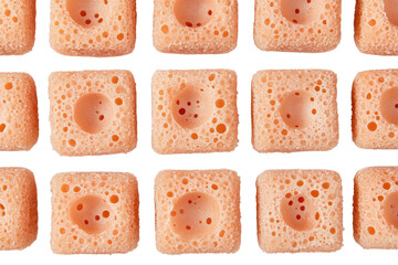 Peach square candy grid with indented centers close up