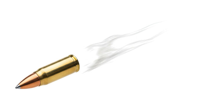 A bullet flying through the air with a white trail.