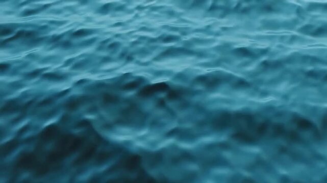 Abstract blue gradient background with smooth flowing wave forms, soft light-to-dark blue transitions, gentle motion creating a calm modern feel, subtle depth and highlights, clean minimal design, sea