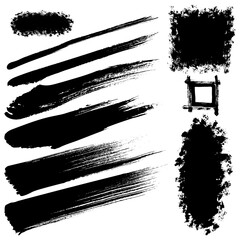 Black brush strokes in different shapes and sizes