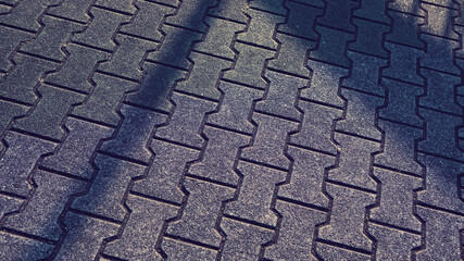 影のかかった石材ブロックの地面