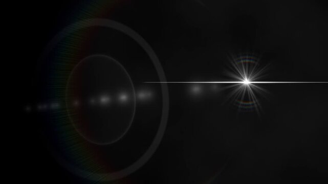 Starburst and circle on gray background with rainbow arc
