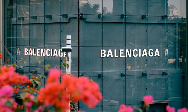 Guangzhou, China - January 18, 2026: Balenciaga luxury fashion brand logo on sleek glass facade of modern retail store. Prominent signage for high-end apparel and designer boutique identity