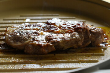 meat steak grill on pan in the kitchen