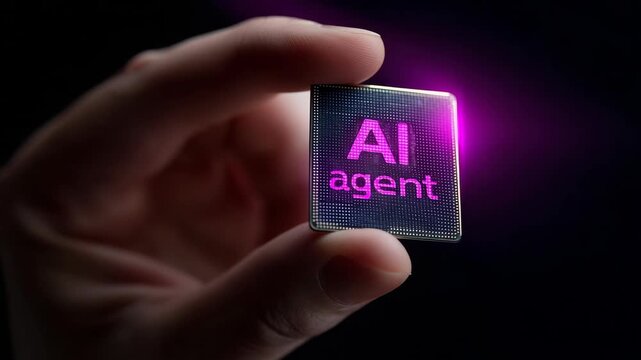 AI agent microchip held in human hand