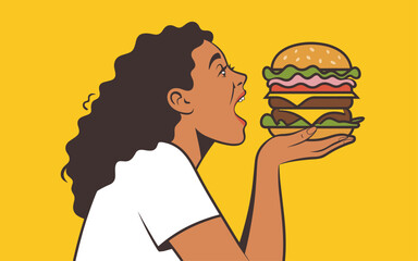 Woman holding a large burger with multiple layers, ready to take a bite, against a bright yellow background from a side view