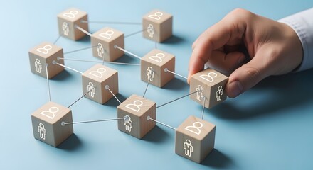 Connecting network of people icons on wooden cubes