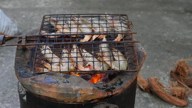 Grilled Shrimp on Charcoal Stove Thai Street Food Seafood BBQ Close Up Video Footage