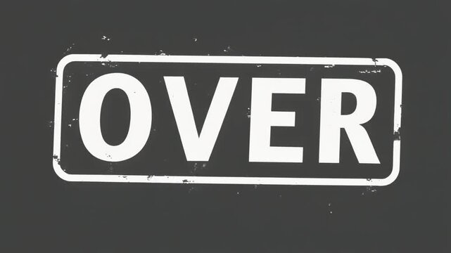 OVER vintage white stamp on dark gray background