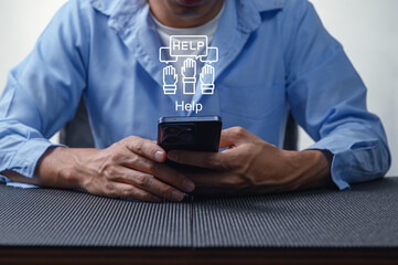 Person Seeking Assistance with Smartphone in Modern Workspace Environment