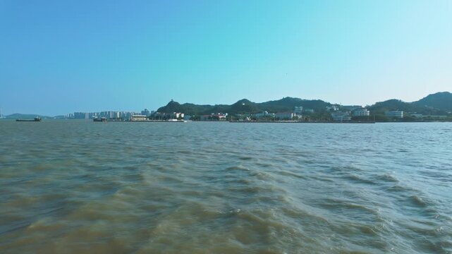 Sailing Along The Zhanjiang Bay In Guangdong Province, Zhanjiang, China. POV Shot