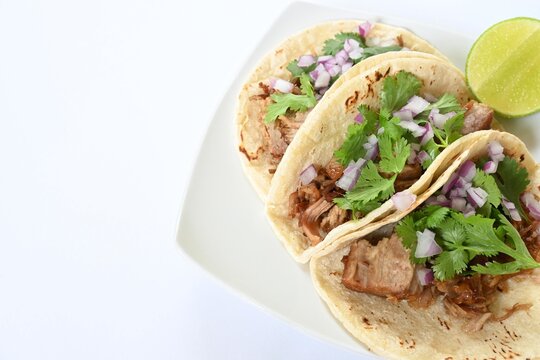 Authentic tacos de maciza, a type of carnitas (lean pork carnitas tacos) ready to eat.