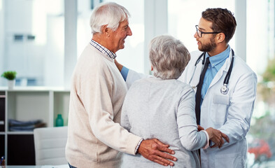 Fototapeta premium Hospital, consulting and doctor with senior couple for support, compassion and news for diagnosis. Healthcare, office and elderly man and woman for talking, medical results and feedback in clinic