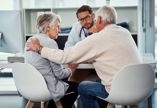 Comfort, senior couple and consultation with doctor for bad news, medical results and empathy. Old people, console and healthcare worker with terminal diagnosis, emotional support and chronic disease