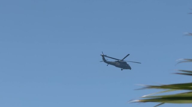  a military helicopter belonging to the Sikorsky H-60 Black Hawk family, specifically configured for naval or utility operations.