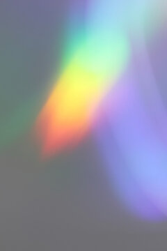 Rainbow light prism effect, transparent background. Hologram reflection, crystal flare leak shadow overlay.