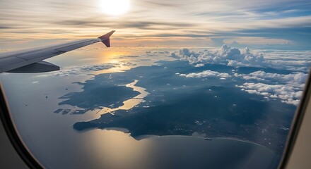 Aerial View of Tropical Island from Airplane Window at Sunset.