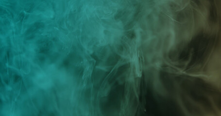 Obraz premium Soft teal smoke gently swirling on a dark backdrop, creating a dreamy atmospheric texture perfect for modern designs, posters, headers, and presentations.