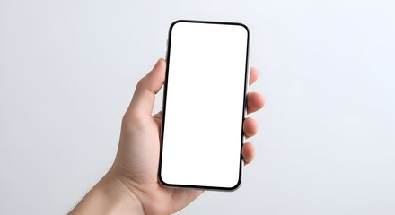 Close Up View Of A Person's Hand Holding A Modern Black Smartphone With A Blank White Screen Display Isolated On A Clean Light Gray Background