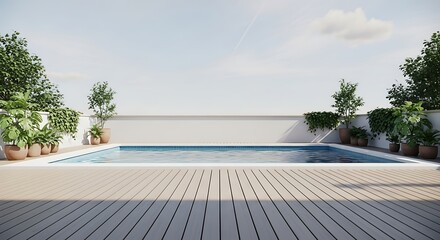 Obraz premium A rectangular pool on a wooden deck surrounded by potted plants, against a white wall and blue sky