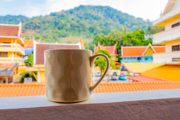 Fototapeta premium Black coffee tropical landscape terrace balcony temple panorama view Thailand.