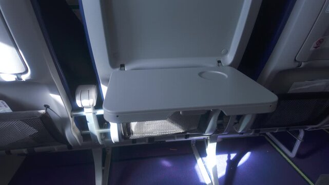 Plane blank tray table Handheld camera parallax movement creating dynamic effect perfect for overlay graphics placement