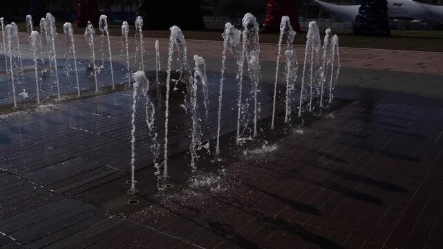 Several water jets arranged with almost perfect symmetry, creating a magnificent dance of water in all its splendor.