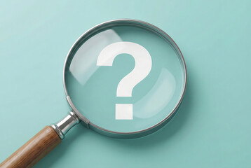 A magnifying glass placed over a large white question mark on a light blue background representing search for answers information gathering and problem solving