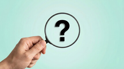 A hand holding a magnifying glass over a black question mark icon on a light blue background representing investigation inquiry and searching for answers