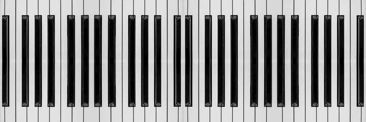 Black and white piano keys close up view © Roberto Sorin