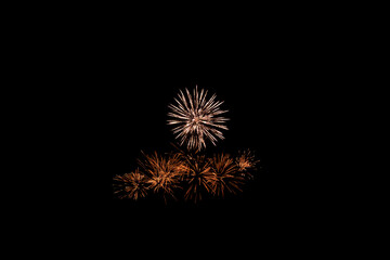 Fototapeta premium Glowing Golden Light Trails and Pyrotechnic Explosion Background
