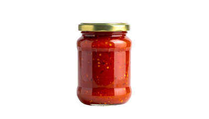 Jar of red-orange preserve with bits, sealed with a golden lid, centered on black