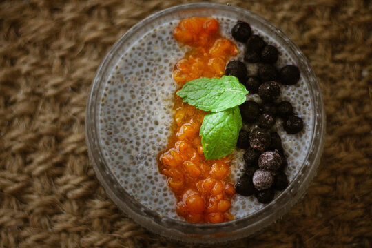 chia pudding with cloudberries and blackcurrants